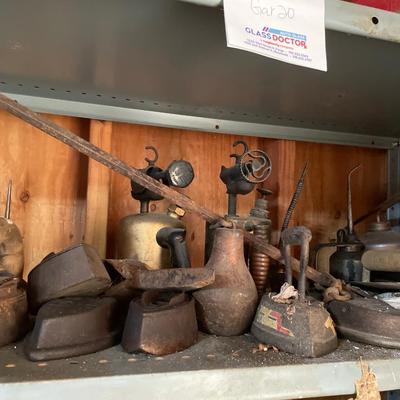 Vintage irons and oil cans