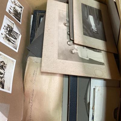 Box of black and white portraits