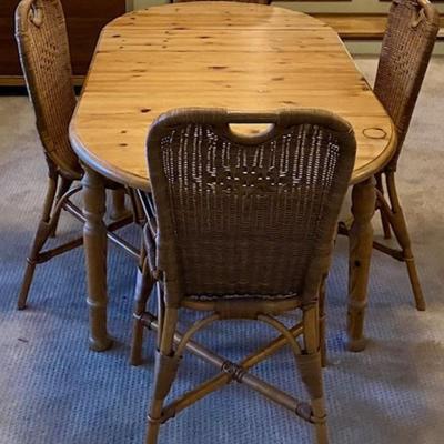 Pine Dining Table And Four Rattan Chairs
