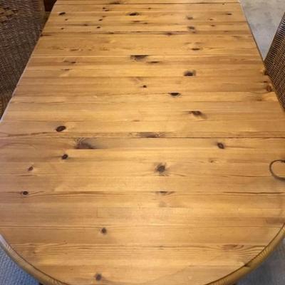 Pine Dining Table And Four Rattan Chairs