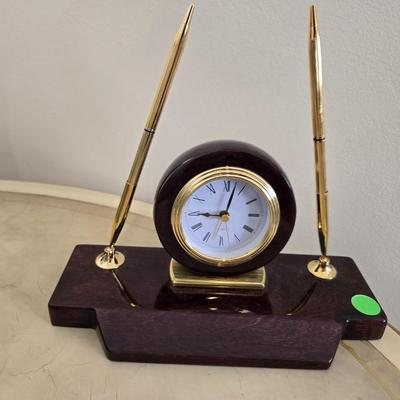Clock and pens