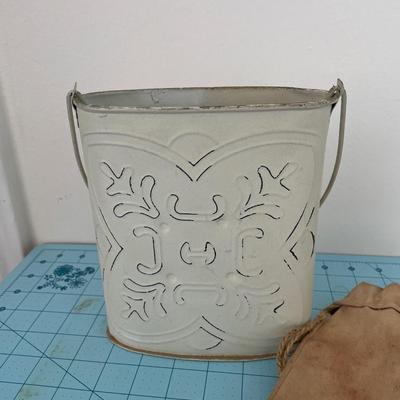 Metal planter and seed bag