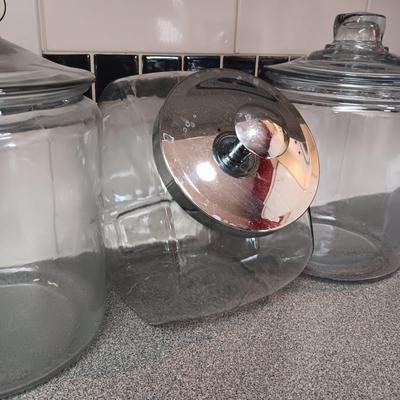 2 LARGE GLASS APOTHECARY JARS AND A GLASS CANISTER