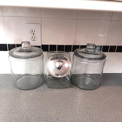 2 LARGE GLASS APOTHECARY JARS AND A GLASS CANISTER