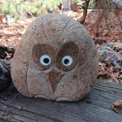 CONCRETE MUSHROOMS BY HENRI STUDIOS, OWL MADE OUT OF A ROCK AND STAKED METAL KOKOPELLI