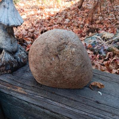 CONCRETE MUSHROOMS BY HENRI STUDIOS, OWL MADE OUT OF A ROCK AND STAKED METAL KOKOPELLI