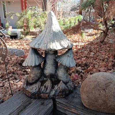 CONCRETE MUSHROOMS BY HENRI STUDIOS, OWL MADE OUT OF A ROCK AND STAKED METAL KOKOPELLI