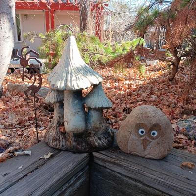 CONCRETE MUSHROOMS BY HENRI STUDIOS, OWL MADE OUT OF A ROCK AND STAKED METAL KOKOPELLI