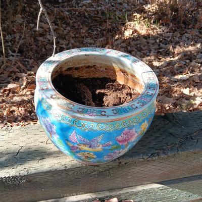 TERRACOTTA SUN AND A FLOWER POT