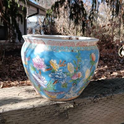 TERRACOTTA SUN AND A FLOWER POT