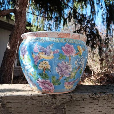TERRACOTTA SUN AND A FLOWER POT