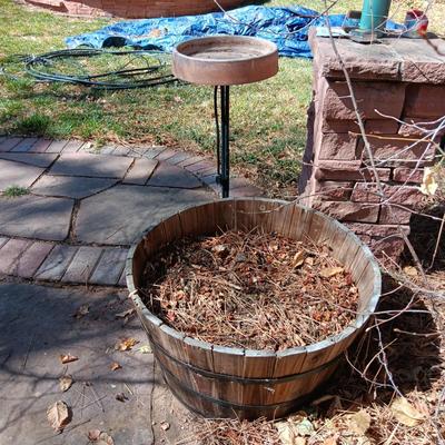 WHISKEY BARREL PLANTER AND A HEATED BIRD BATH