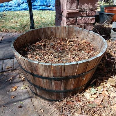 WHISKEY BARREL PLANTER AND A HEATED BIRD BATH