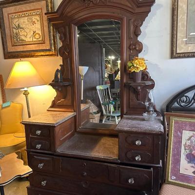 Renaissance antique walnut step down dresser with stone top