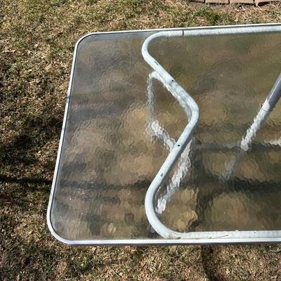 GLASS TOP PATIO TABLE AND AN UMBRELLA