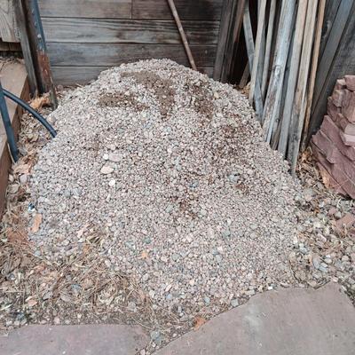 2 SMALLER PILES OF GRAVEL