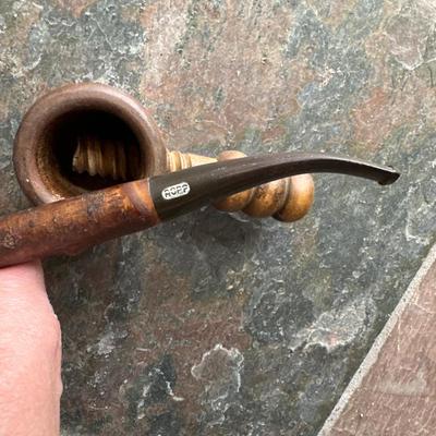 wood pipe and nut cracker
