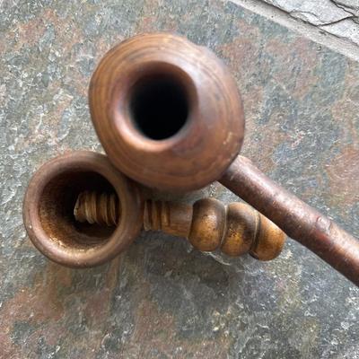 wood pipe and nut cracker