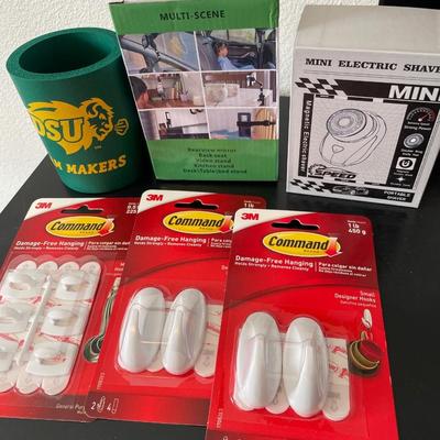 Command strips, shaver, cup holders