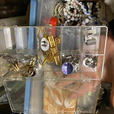 Assorted jewelry items with cuff links