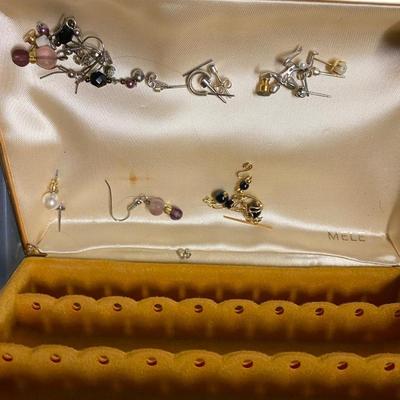 Assorted jewelry items with cuff links