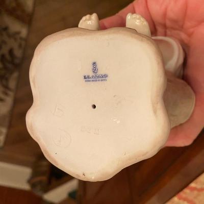 Porcelain Lladro boy sitting on a stump #4876