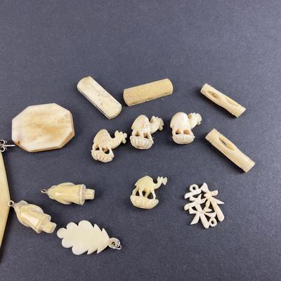 -205- JEWELRY | Assortment Of Miscellaneous Carved Bone Pieces