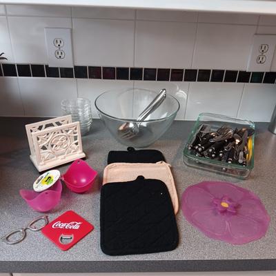 ASSORTED FLATWARE, GLASS SERVING BOWL AND BAKING DISH, CAST IRON NAPKIN HOLDER