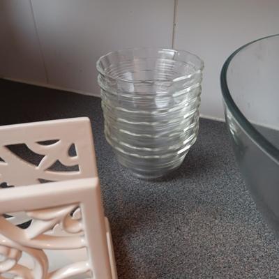 ASSORTED FLATWARE, GLASS SERVING BOWL AND BAKING DISH, CAST IRON NAPKIN HOLDER