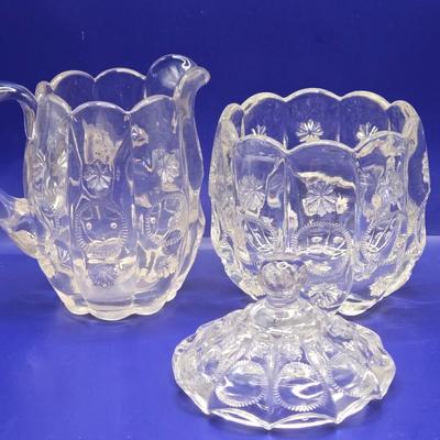 LOT 1L: Variety of Crystal and Glass Pieces Including Large Platter, Covered Cheese Dish, Creamer & Sugar, and More