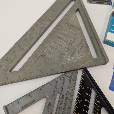 Assortment Of Hardware Supplies Squares Caulk Gun