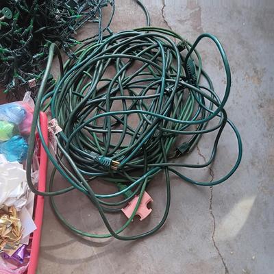 LIGHTED GARLAND AND LARGE WREATH, CHRISTMAS LIGHTS, EXTENSION CORDS AND MORE
