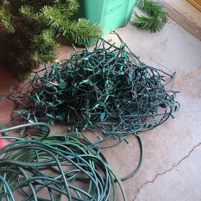 LIGHTED GARLAND AND LARGE WREATH, CHRISTMAS LIGHTS, EXTENSION CORDS AND MORE
