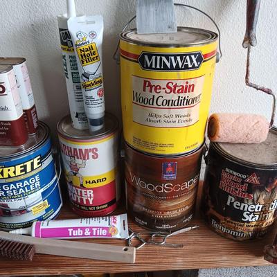 PARTIALLY FULL CANS OF STAIN AND PAINT SUPPLIES
