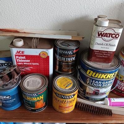 PARTIALLY FULL CANS OF STAIN AND PAINT SUPPLIES