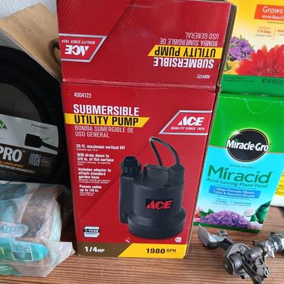 NEW SUBMERSIBLE UTILITY PUMP AND SOAKER HOSE PLUS OTHER YARD AND GARDEN NEEDS