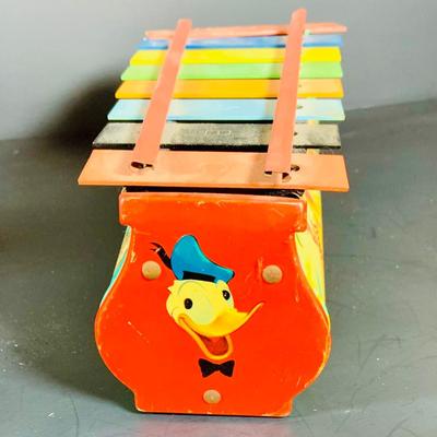 LOT 235: Disney Collections Featuring Mickey and Minnie Mouse Plushes Both Vintage and Contemporary, a Vintage Donald Duck Toy Xylophone...