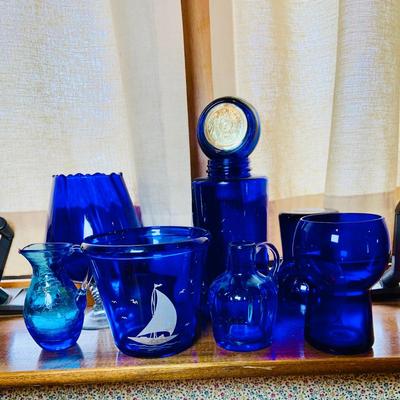 LOT 240: Collection of Cobalt Blue Art Glass - Small Pitchers, Glasses, Bottle Stoper and More