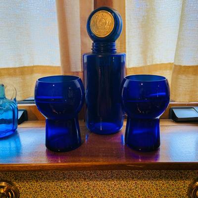 LOT 240: Collection of Cobalt Blue Art Glass - Small Pitchers, Glasses, Bottle Stoper and More