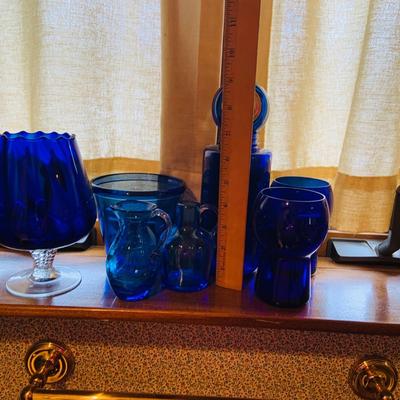 LOT 240: Collection of Cobalt Blue Art Glass - Small Pitchers, Glasses, Bottle Stoper and More