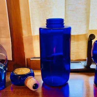LOT 240: Collection of Cobalt Blue Art Glass - Small Pitchers, Glasses, Bottle Stoper and More