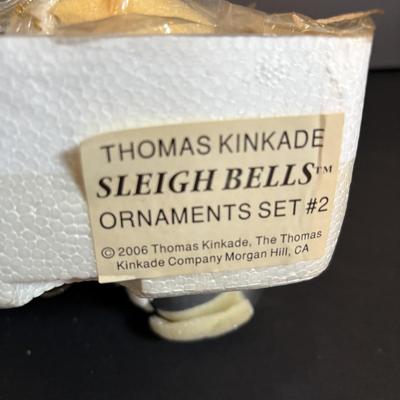 LOT 281: Thomas Kinkade Sleigh Bell Ornaments by Ashton Drake