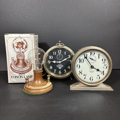 LOT 283: Vintage Wind-Up Alarm Clock: Westclox Big Ben, Ward's Old Reliable and 1879 Edison Lamp Replica