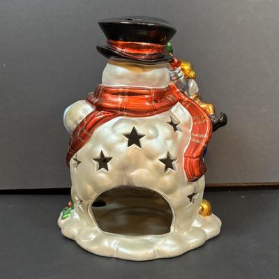 LOT 289: Hand-Crafted Counted Cross-Stiches, Home Decor Peppermint Tri Cycle, Christmas Around the World Shimmering Snowman Votive &...