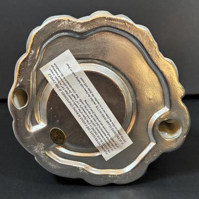 LOT 289: Hand-Crafted Counted Cross-Stiches, Home Decor Peppermint Tri Cycle, Christmas Around the World Shimmering Snowman Votive &...