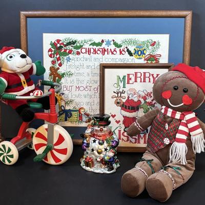 LOT 289: Hand-Crafted Counted Cross-Stiches, Home Decor Peppermint Tri Cycle, Christmas Around the World Shimmering Snowman Votive &...