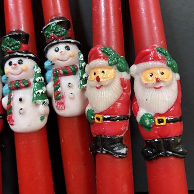 LOT 290: Holiday Candle Collection & More: Santa & Snowman Tapered Candles,Gift Bag Music Boxes, Gold Bead Garland, Peppermint...