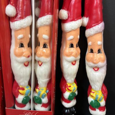 LOT 290: Holiday Candle Collection & More: Santa & Snowman Tapered Candles,Gift Bag Music Boxes, Gold Bead Garland, Peppermint...