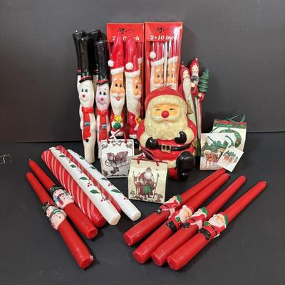 LOT 290: Holiday Candle Collection & More: Santa & Snowman Tapered Candles,Gift Bag Music Boxes, Gold Bead Garland, Peppermint...