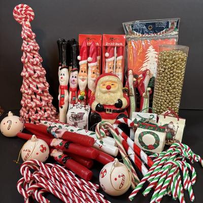 LOT 290: Holiday Candle Collection & More: Santa & Snowman Tapered Candles,Gift Bag Music Boxes, Gold Bead Garland, Peppermint...